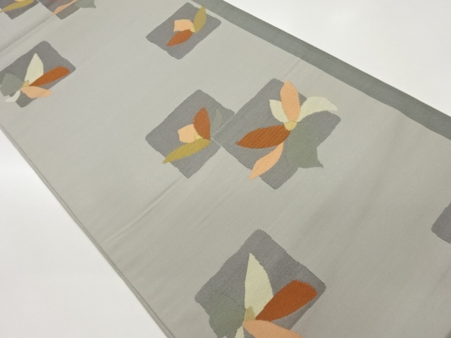 色紙に抽象花模様織出し袋帯